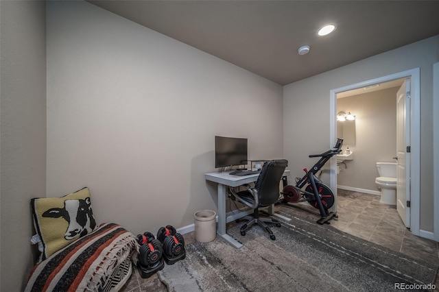 office featuring recessed lighting and baseboards