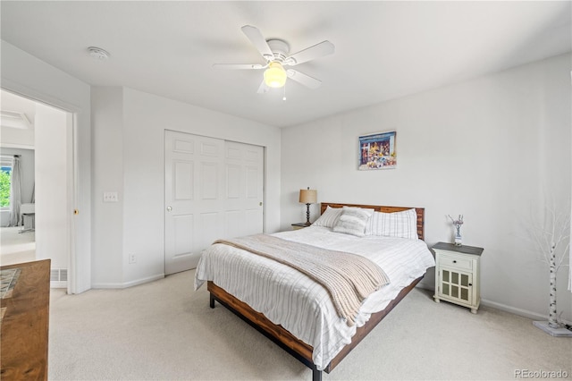 6808 Silverleaf Ave, Firestone, CO 80504 - bedroom with light carpet, a closet, and ceiling fan