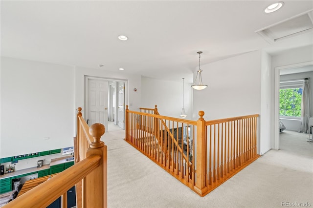 6808 Silverleaf Ave, Firestone, CO 80504 - hall with an upstairs landing, carpet floors, and recessed lighting