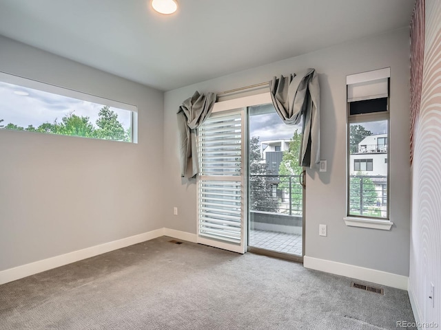 4535 Stuart St, Denver, CO 80212 - carpeted spare room featuring baseboards