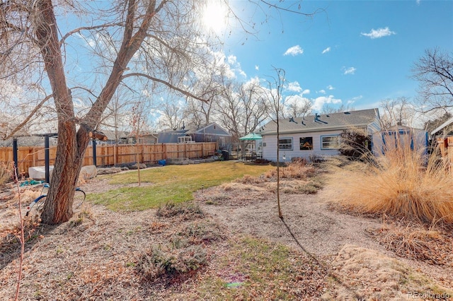 view of yard with fence