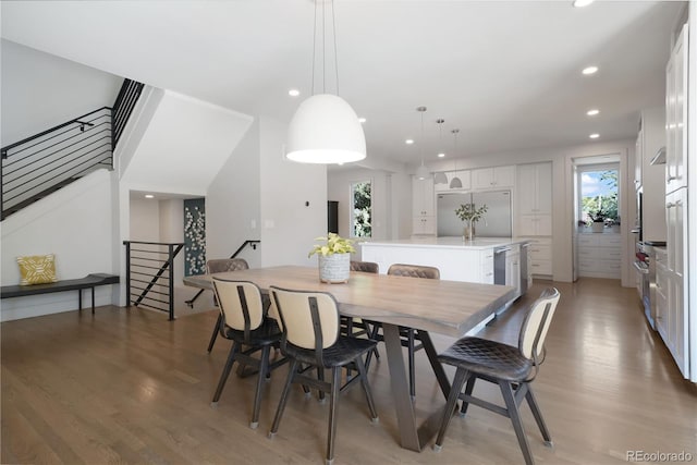 3450 S Cherry St, Denver, CO 80222 - dining area with plenty of natural light, light wood-type flooring, recessed lighting, and stairway