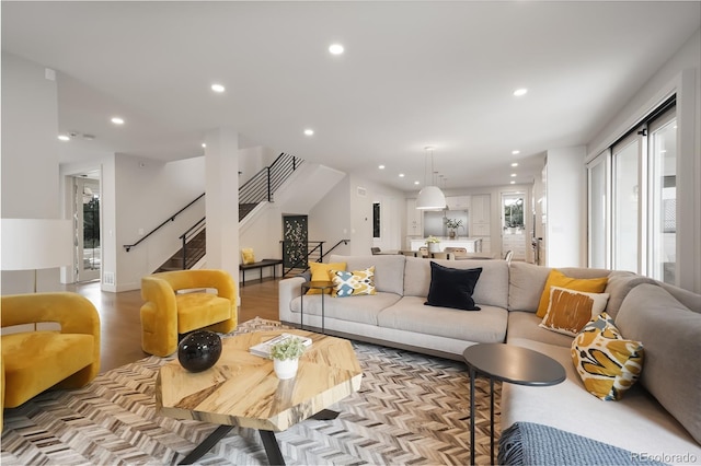 3450 S Cherry St, Denver, CO 80222 - living area with recessed lighting, stairs, and light wood-type flooring