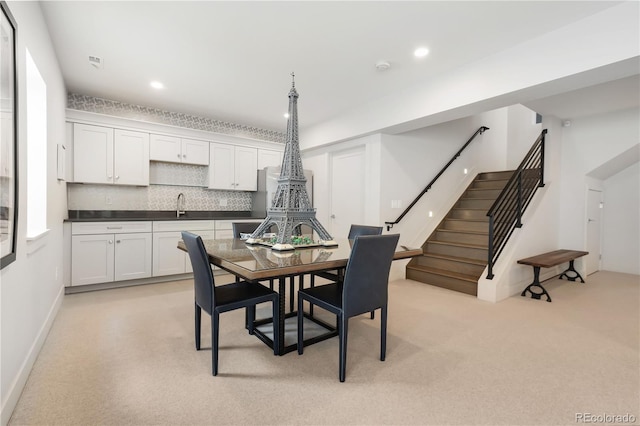 3450 S Cherry St, Denver, CO 80222 - dining room featuring light carpet, stairs, recessed lighting, and bar with sink