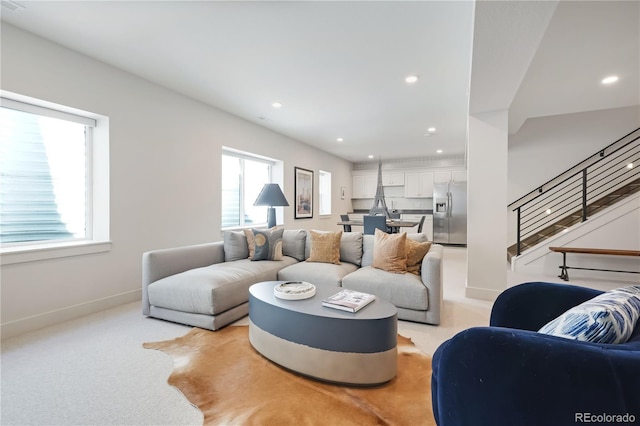 3450 S Cherry St, Denver, CO 80222 - living area with stairway, recessed lighting, and light colored carpet