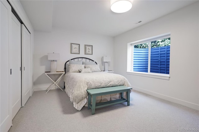 3450 S Cherry St, Denver, CO 80222 - bedroom with light carpet and a closet