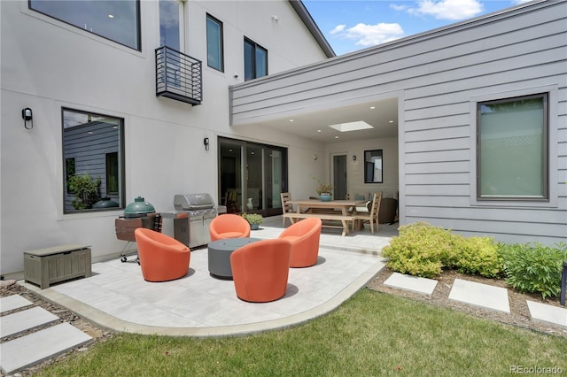 3450 S Cherry St, Denver, CO 80222 - view of patio with a grill and outdoor dining space