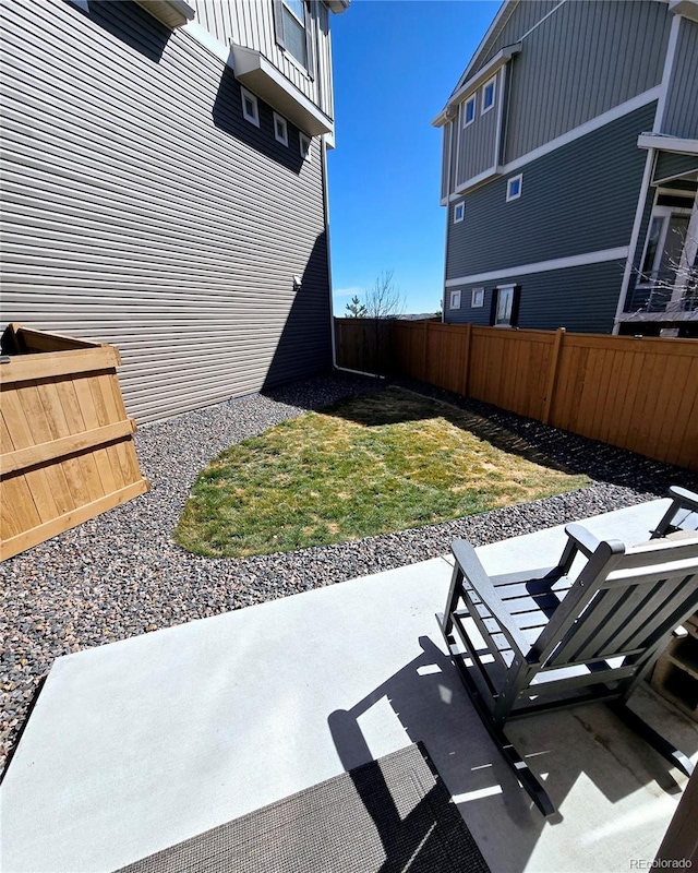 view of patio with fence