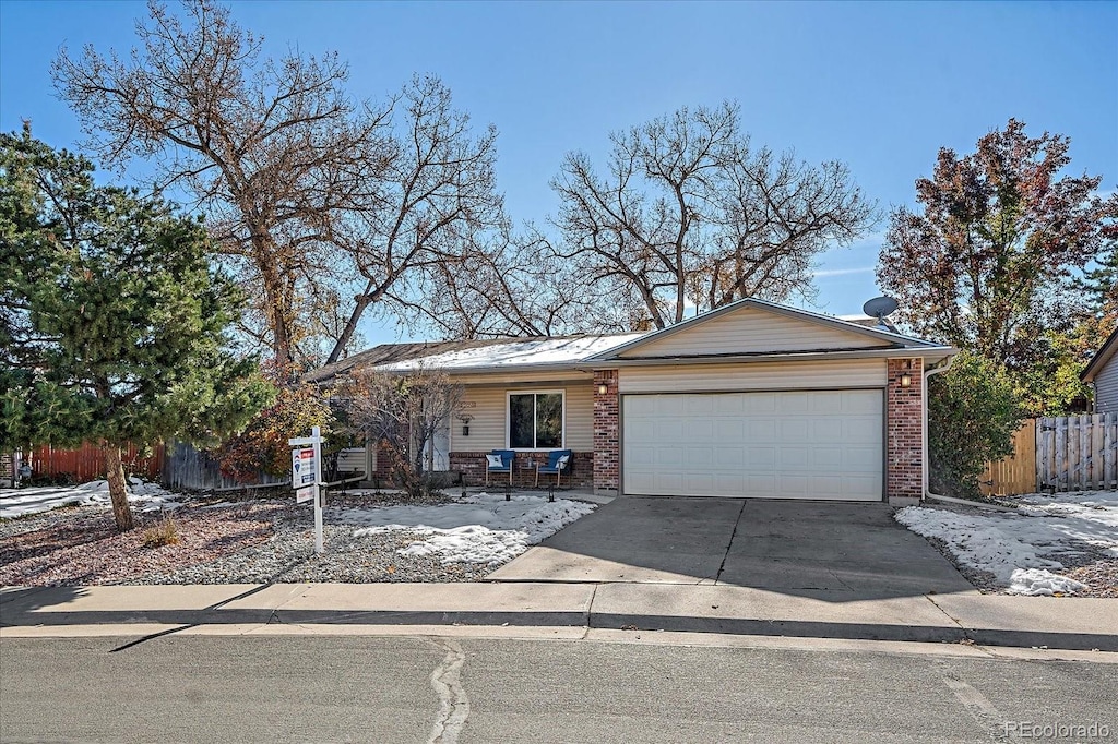 single story home featuring a garage