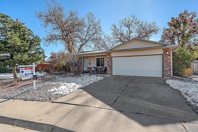 ranch-style house featuring a garage