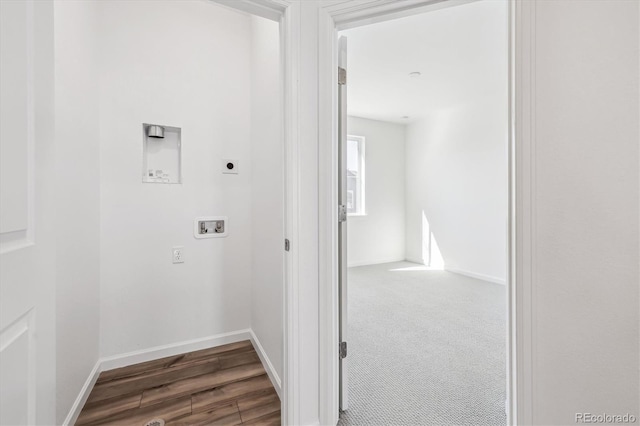 corridor with baseboards and wood finished floors