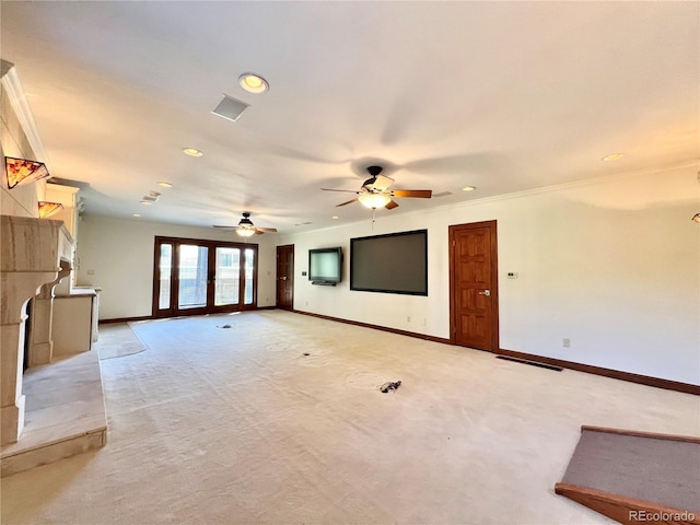 unfurnished living room featuring ceiling fan, visible vents, baseboards, light carpet, and recessed lighting