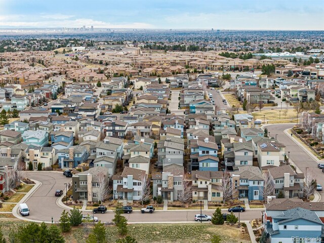 birds eye view of property with a residential view