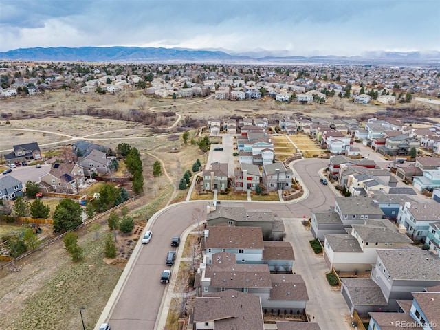 aerial view featuring a mountain view and a residential view