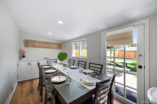 5570 Otis Ct, Arvada, CO 80002 - dining space with wood finished floors, recessed lighting, baseboards, and vaulted ceiling