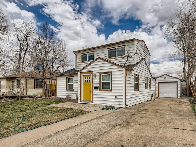 5570 Otis Ct, Arvada, CO 80002 - view of front of property with an outdoor structure, concrete driveway, a detached garage, and a front yard