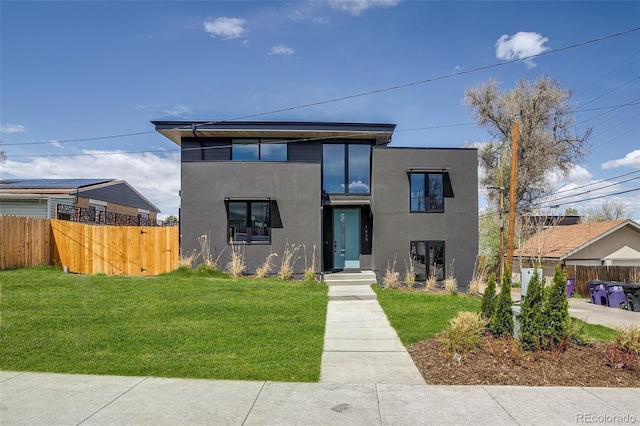 1459 W 42nd Ave, Denver, CO 80211 - contemporary house featuring fence, stucco siding, and a front lawn