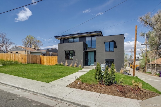 1459 W 42nd Ave, Denver, CO 80211 - modern home featuring fence, stucco siding, and a front yard