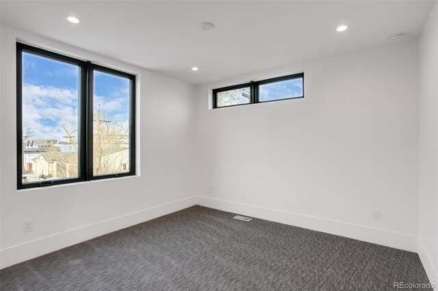 1459 W 42nd Ave, Denver, CO 80211 - spare room with recessed lighting, baseboards, and dark carpet