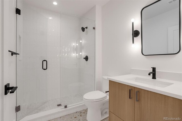 1459 W 42nd Ave, Denver, CO 80211 - full bath featuring vanity, a stall shower, and toilet