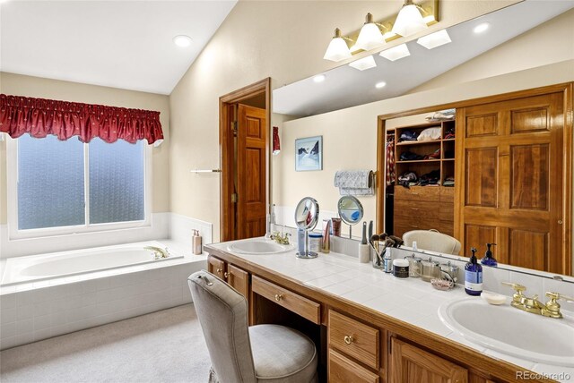 4498 Buena Vista Ct, Castle Rock, CO 80109 - bathroom with lofted ceiling, double vanity, a garden tub, and recessed lighting