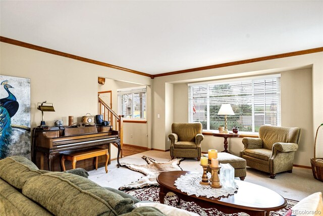 4498 Buena Vista Ct, Castle Rock, CO 80109 - living area with baseboards, ornamental molding, light carpet, and stairs