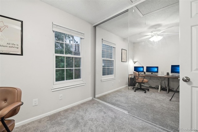 1198 Milo Cir Unit A, Lafayette, CO 80026 - carpeted office space with a textured ceiling, baseboards, and a ceiling fan