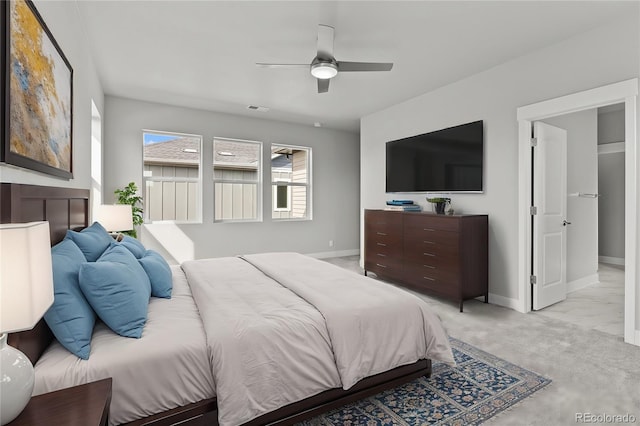 21204 E 63rd Dr, Aurora, CO 80019 - bedroom with light colored carpet, baseboards, a ceiling fan, and visible vents