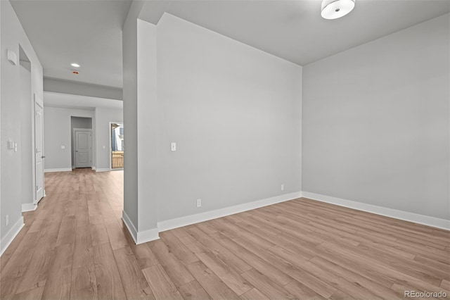 21204 E 63rd Dr, Aurora, CO 80019 - spare room featuring light wood-style flooring, baseboards, and recessed lighting