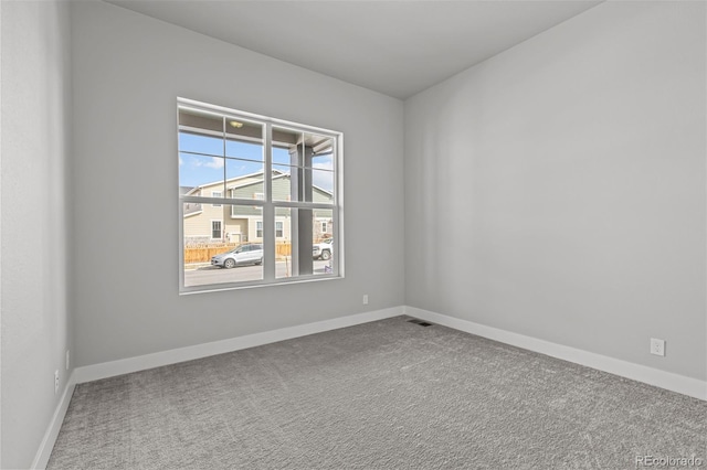 21204 E 63rd Dr, Aurora, CO 80019 - unfurnished room with carpet floors and baseboards