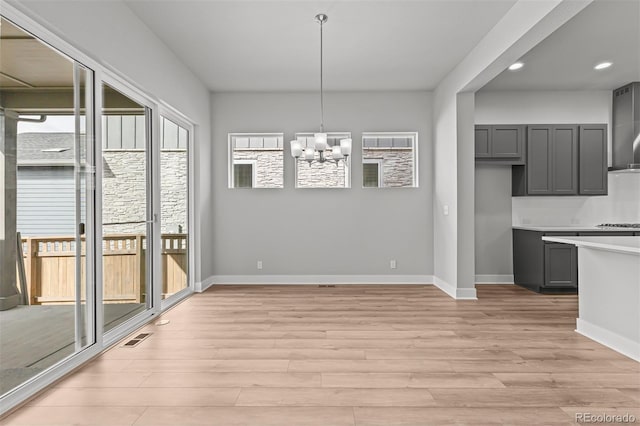21204 E 63rd Dr, Aurora, CO 80019 - unfurnished dining area with recessed lighting, light wood finished floors, and baseboards