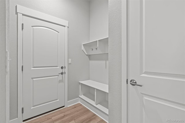 21204 E 63rd Dr, Aurora, CO 80019 - mudroom with baseboards and light wood finished floors