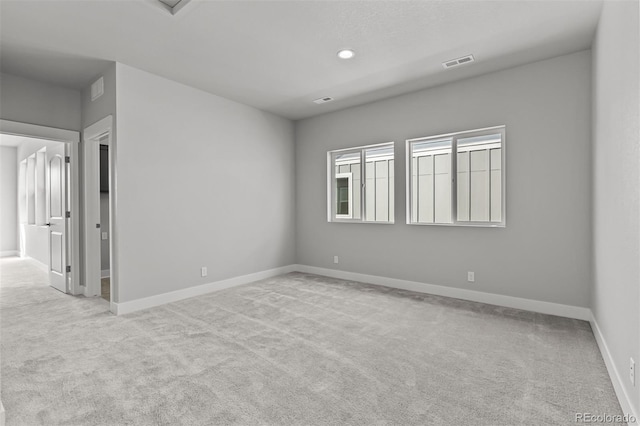 21204 E 63rd Dr, Aurora, CO 80019 - spare room featuring baseboards, visible vents, carpet, and recessed lighting