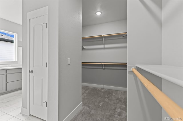 21204 E 63rd Dr, Aurora, CO 80019 - walk in closet with light colored carpet