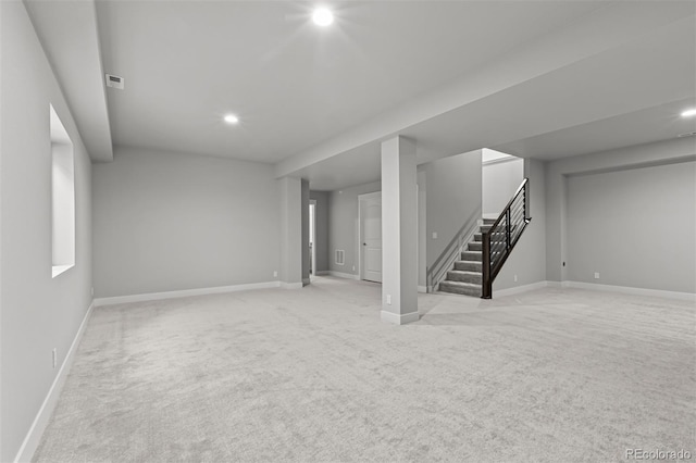 21204 E 63rd Dr, Aurora, CO 80019 - finished basement with visible vents, baseboards, recessed lighting, light colored carpet, and stairway