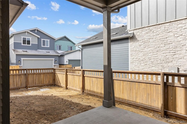 21204 E 63rd Dr, Aurora, CO 80019 - view of yard with an attached garage and a fenced backyard