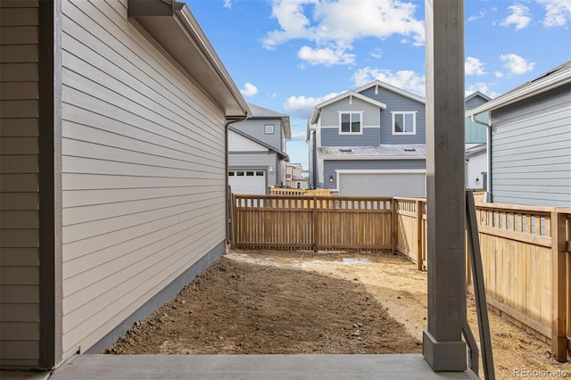 21204 E 63rd Dr, Aurora, CO 80019 - view of yard with fence and a garage