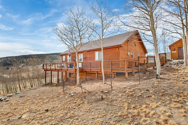 612 Sheep Ridge Rd, Fairplay, CO 80440 - back of property featuring a deck and a shingled roof