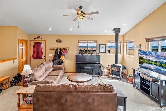 612 Sheep Ridge Rd, Fairplay, CO 80440 - living room with light colored carpet, a wood stove, plenty of natural light, ceiling fan, and recessed lighting