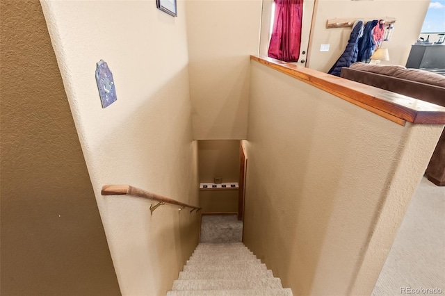 612 Sheep Ridge Rd, Fairplay, CO 80440 - staircase with a textured wall and carpet floors