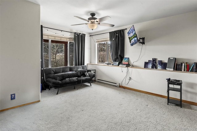 612 Sheep Ridge Rd, Fairplay, CO 80440 - sitting room featuring baseboard heating, a ceiling fan, and carpet floors