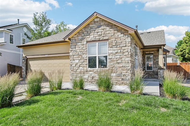 19677 E Vassar Dr, Aurora, CO 80013 - view of front of property with stone siding, a garage, and a shingled roof