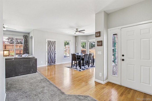 19677 E Vassar Dr, Aurora, CO 80013 - entrance foyer with a ceiling fan and wood finished floors