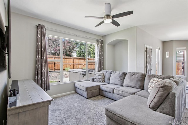 19677 E Vassar Dr, Aurora, CO 80013 - living area featuring carpet, healthy amount of natural light, and a ceiling fan
