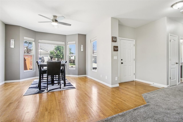19677 E Vassar Dr, Aurora, CO 80013 - dining space featuring a ceiling fan and wood finished floors