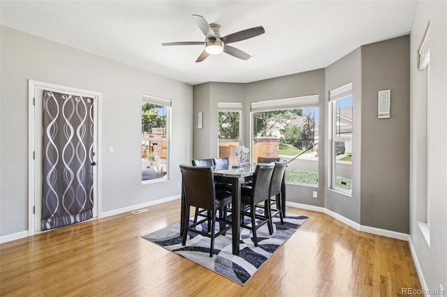 19677 E Vassar Dr, Aurora, CO 80013 - dining space featuring light wood finished floors and ceiling fan
