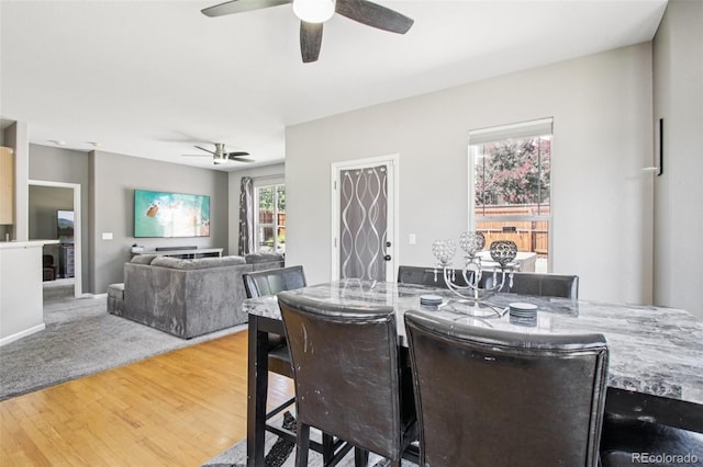19677 E Vassar Dr, Aurora, CO 80013 - dining room featuring ceiling fan and wood finished floors