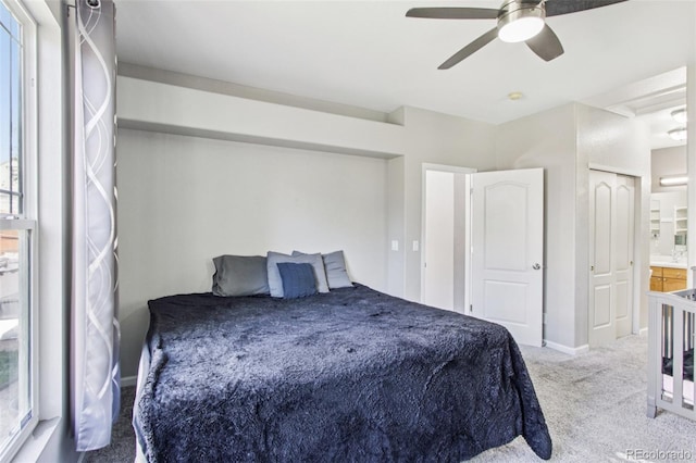 19677 E Vassar Dr, Aurora, CO 80013 - carpeted bedroom with ceiling fan and baseboards