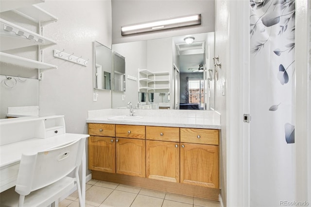 19677 E Vassar Dr, Aurora, CO 80013 - bathroom with tile patterned floors and vanity
