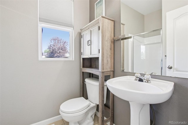 19677 E Vassar Dr, Aurora, CO 80013 - full bathroom featuring toilet and a shower with shower door
